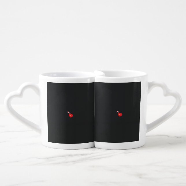 a red flower with a black background coffee mug set (Front Nesting)