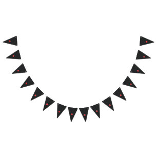 a red flower with a black center on a black backgr bunting flags