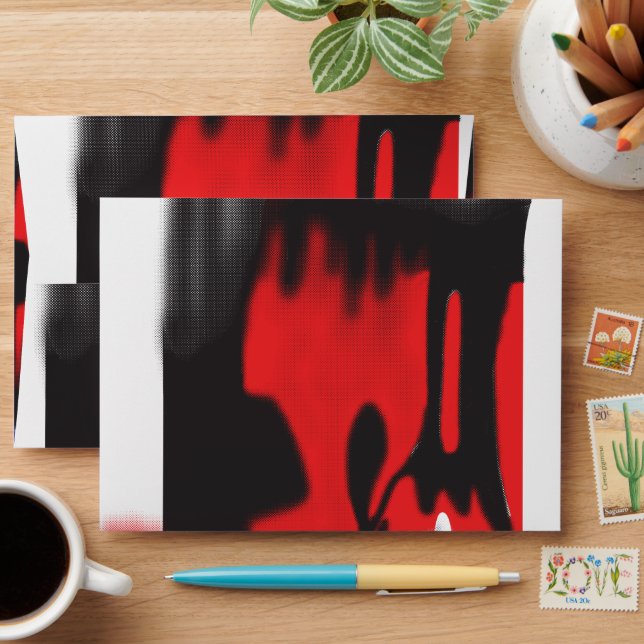 A red graphic design featuring bold geometric shap envelope (Desk)