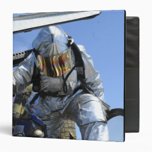 A rescue drill is performed on the flight deck binder