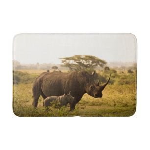 A Rhino with her baby Bath Mat