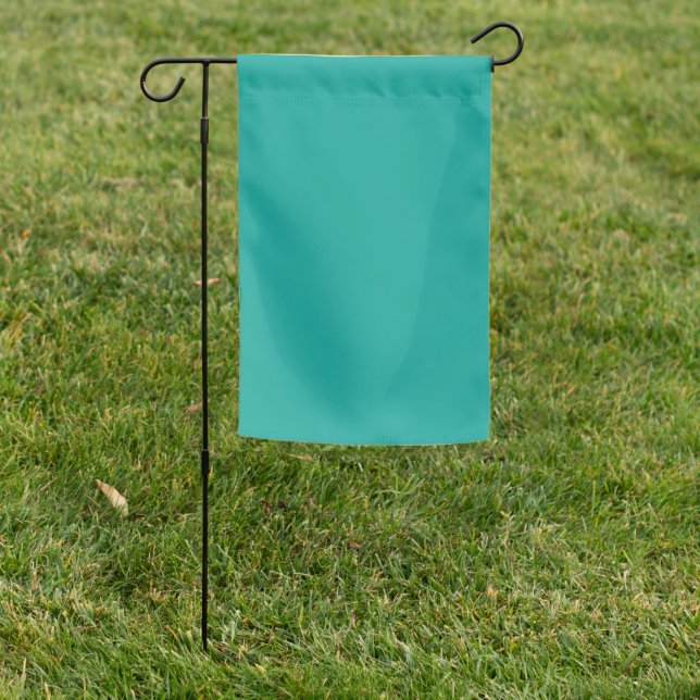A rich teal green area highlighted by a contrastin garden flag (In SItu)