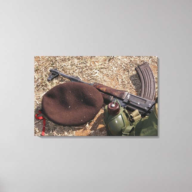 A rifle, military cover and canteen canvas print (Front)