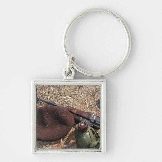 A rifle, military cover and canteen keychain (Front)