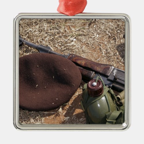 A rifle military cover and canteen metal ornament