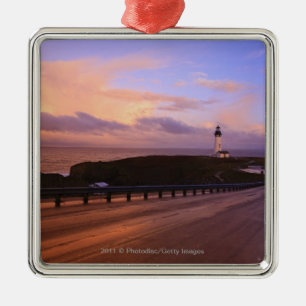 A Road & A Lighthouse Along The Coast At Sunset Metal Ornament