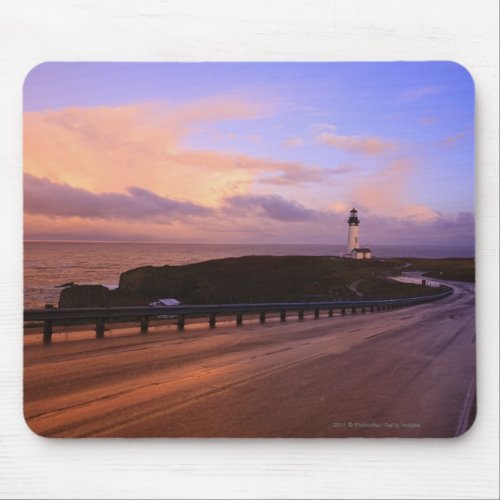 A Road  A Lighthouse Along The Coast At Sunset Mouse Pad