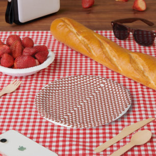 A rolled-up piece of wrapping paper with a festive plates