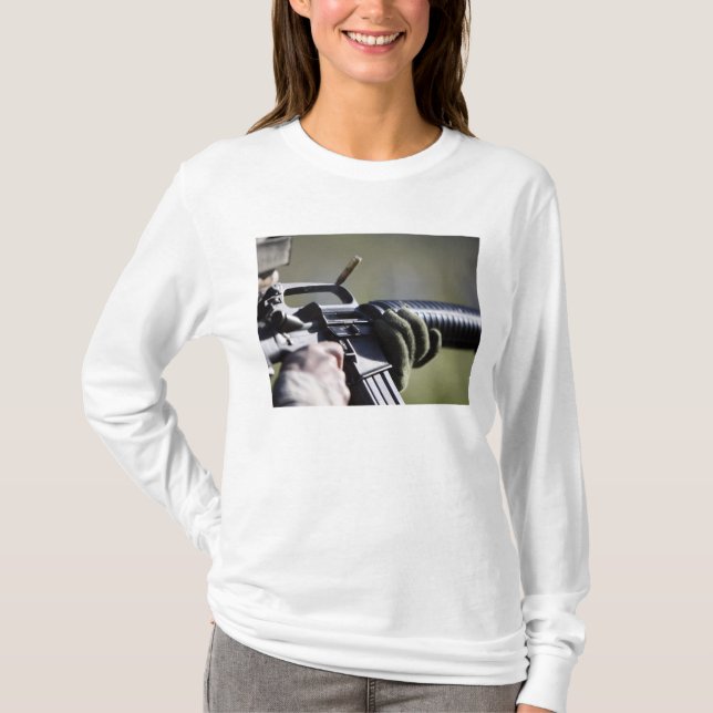 A round flies from the chamber of an M-16A2 T-Shirt (Front)