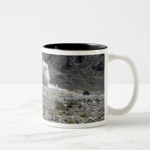 A round from an AT-4 small rocket launcher Two-Tone Coffee Mug