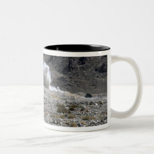 A round from an AT-4 small rocket launcher Two-Tone Coffee Mug