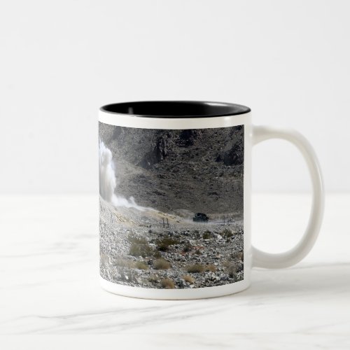 A round from an AT_4 small rocket launcher Two_Tone Coffee Mug