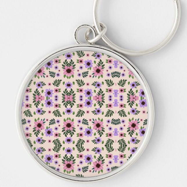 A round keychain featuring a vibrant floral  (Front)