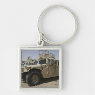 A row of humvees from Task Force Military Polic Keychain