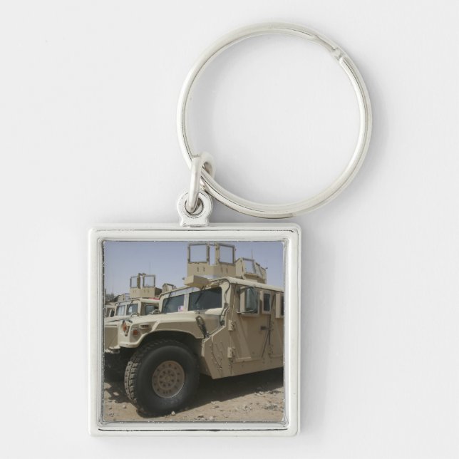 A row of humvees from Task Force Military Polic Keychain (Front)