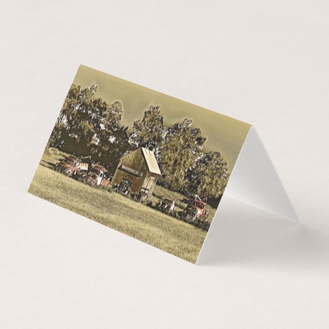 A row of jalopies in the grass. (Front)