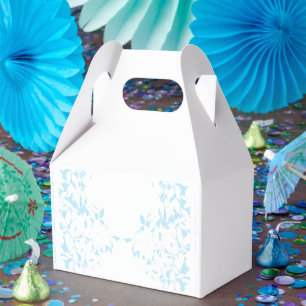 A rug featuring a blue and white creative arts mot favor boxes