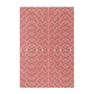 A rug with a red and pink motif features a decorat acrylic print