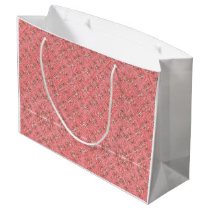 A rug with a red and pink motif features a decorat large gift bag