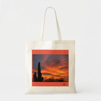 A sahuaro cactus with stunning sunset tote bag