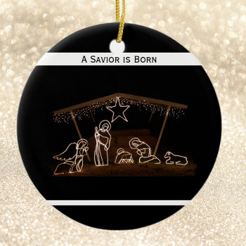 A Savior Is Born Religious Christian Christmas Ceramic Ornament by ornamentsbyhenis at Zazzle