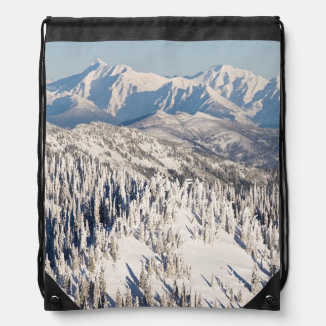A Scenic View of Snowy Mountains and Trees. Drawstring Bag (Front)