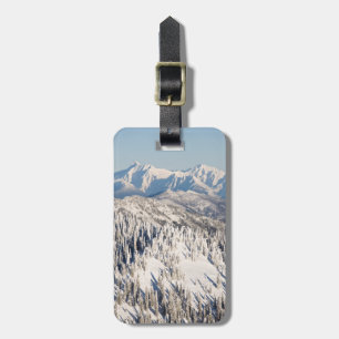 A Scenic View of Snowy Mountains and Trees. Luggage Tag