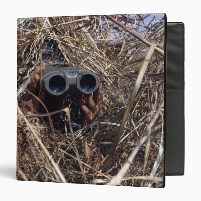 A scout observer practices observation techniqu 2 binder (Front/Inside)