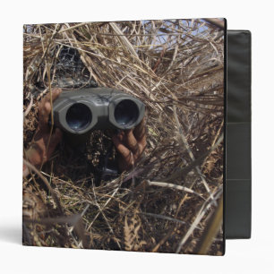 A scout observer practices observation techniqu binder