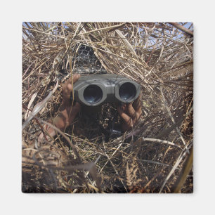 A scout observer practices observation techniqu magnet