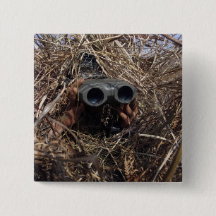A scout observer practices observation techniqu pinback button