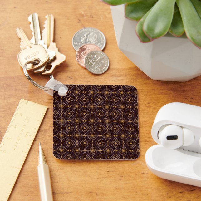A seamless geometric pattern featuring gold art  keychain (Desk)