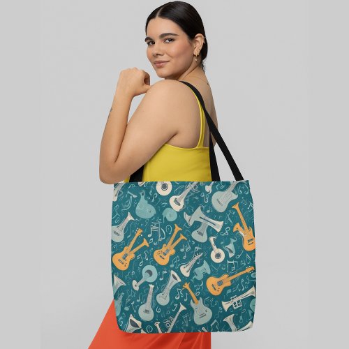 A seamless pattern featuring musical instruments tote bag