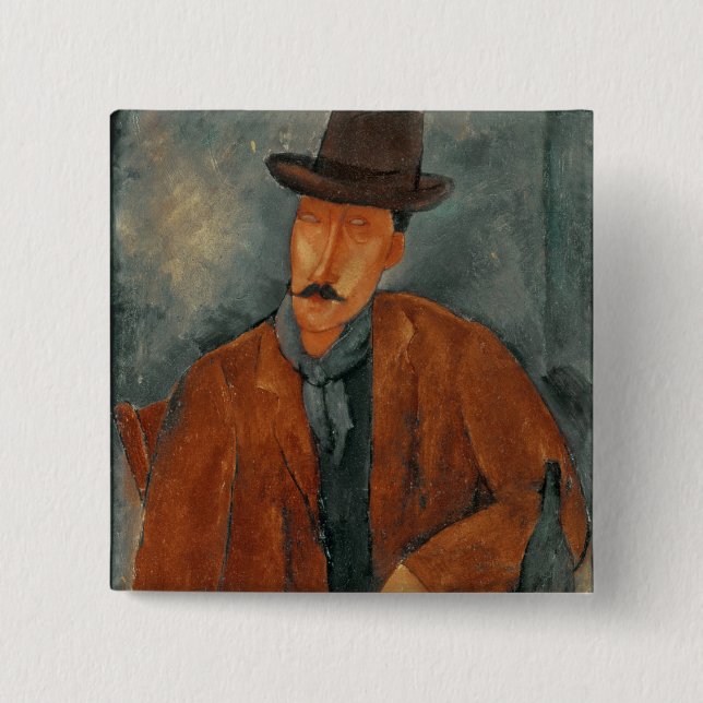 A seated man leaning on a table pinback button (Front)