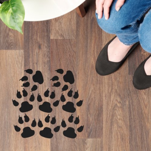 A selection of 8 dog paw prints  floor decals