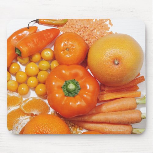 A selection of orange fruits  vegetables mouse pad