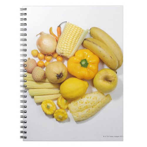 A selection of yellow fruits  vegetables notebook
