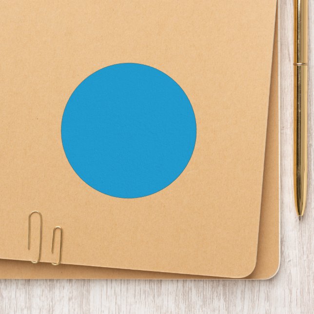 A serene blue sky with a few scattered white cloud patch (On Folder)