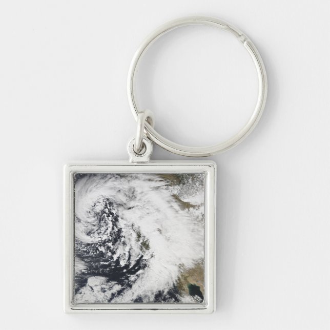 A series of strong storms with fierce winds keychain (Front)