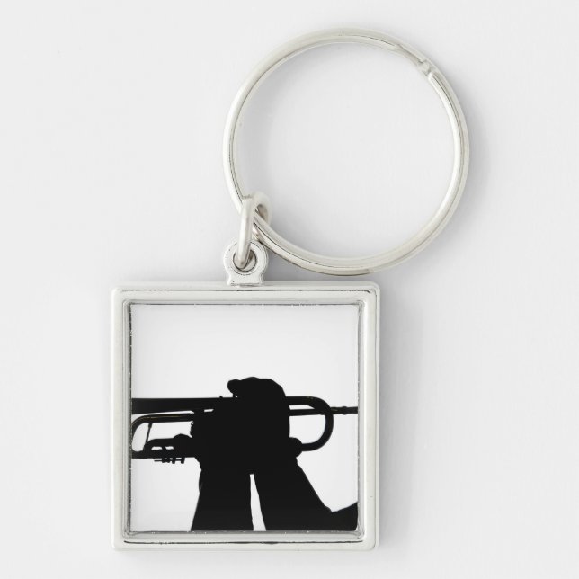 A service member plays a tune keychain (Front)