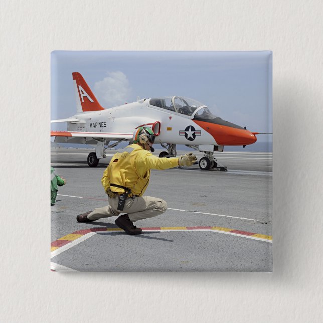 A shooter aboard the aircraft carrier button (Front)