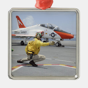 A shooter aboard the aircraft carrier metal ornament