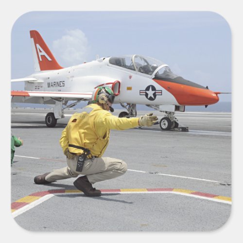 A shooter aboard the aircraft carrier square sticker