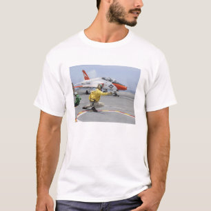 A shooter aboard the aircraft carrier T-Shirt