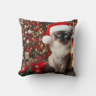 A Siamese cat with Santa hat Throw Pillow