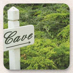 A sign pointing tho the wine cellar (Cave) in Drink Coaster
