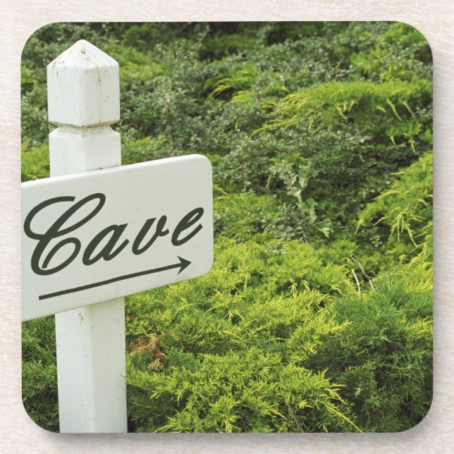 A sign pointing tho the wine cellar (Cave) in Drink Coaster (Front)