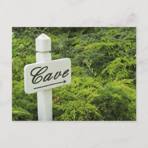 A sign pointing tho the wine cellar (Cave) in Postcard