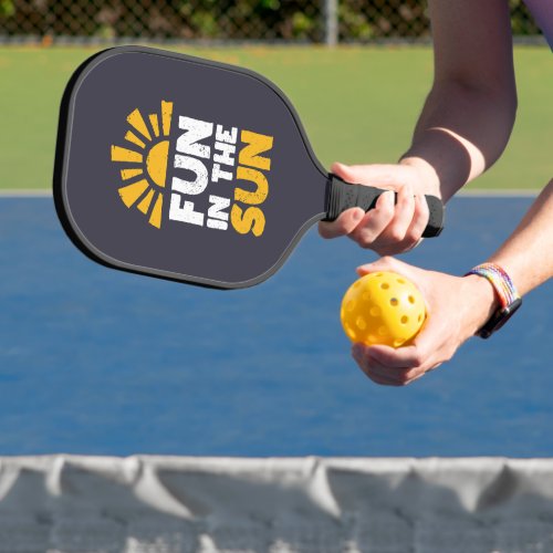 A sign that says fun on the sun pickleball paddle