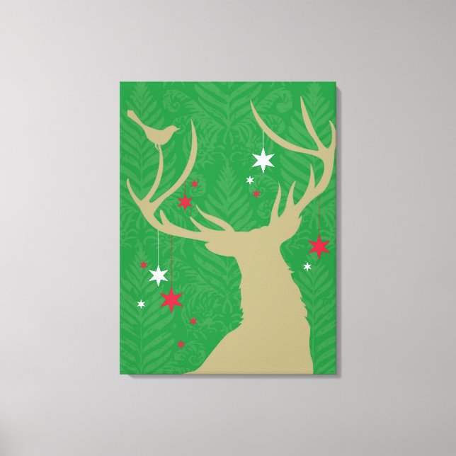A silhouette of a deer with stars hanging from its canvas print (Front)